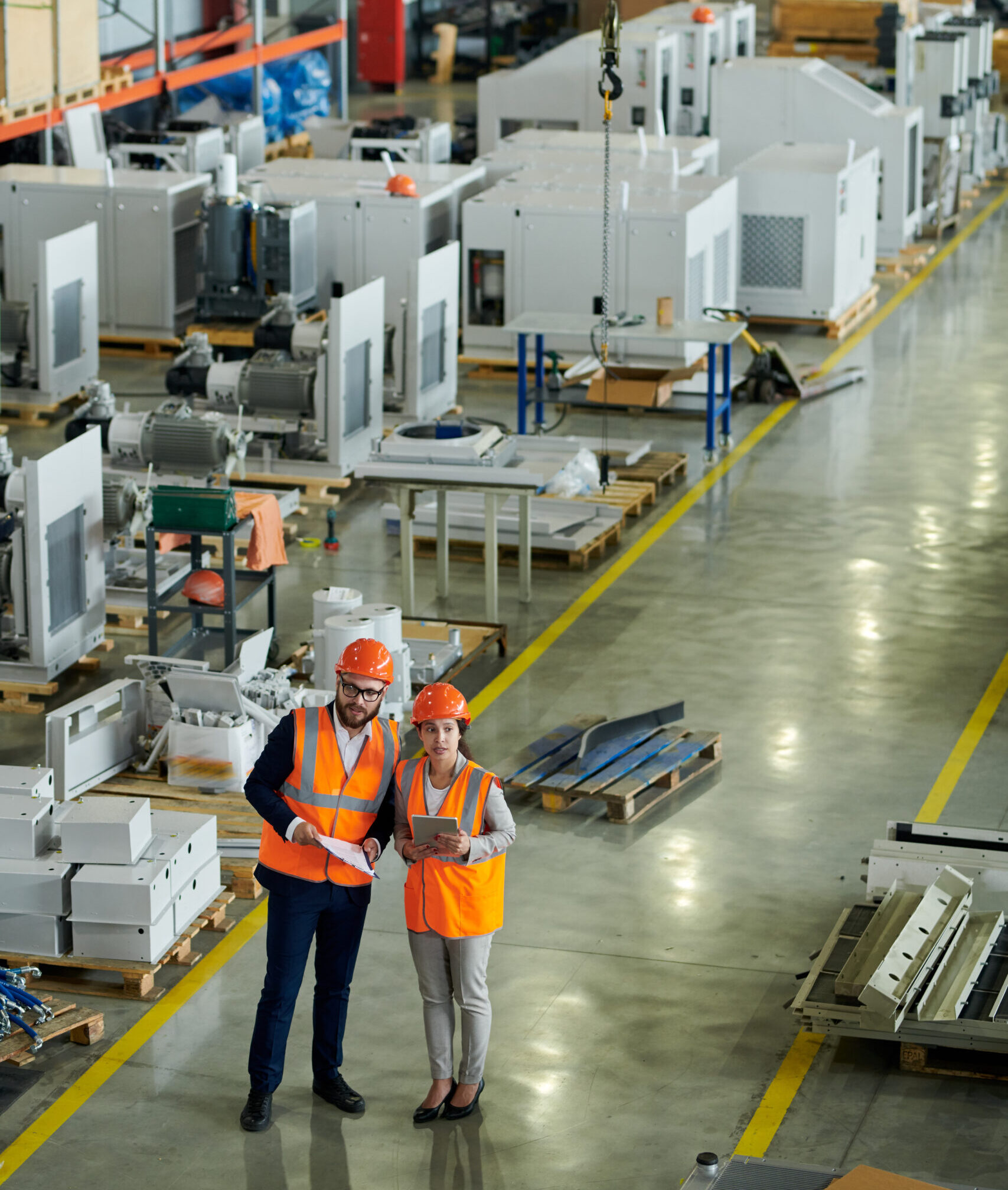 Foreman Inspecting Production